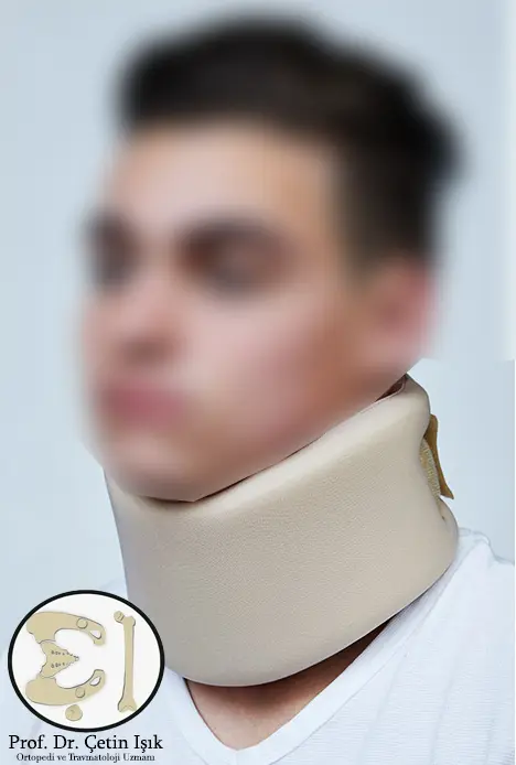 A picture showing the patient wearing a neck collar to relieve pressure on the neck ligaments